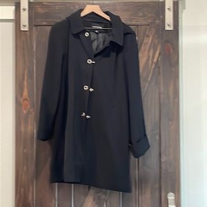 London Fog Women’s lined raincoat.